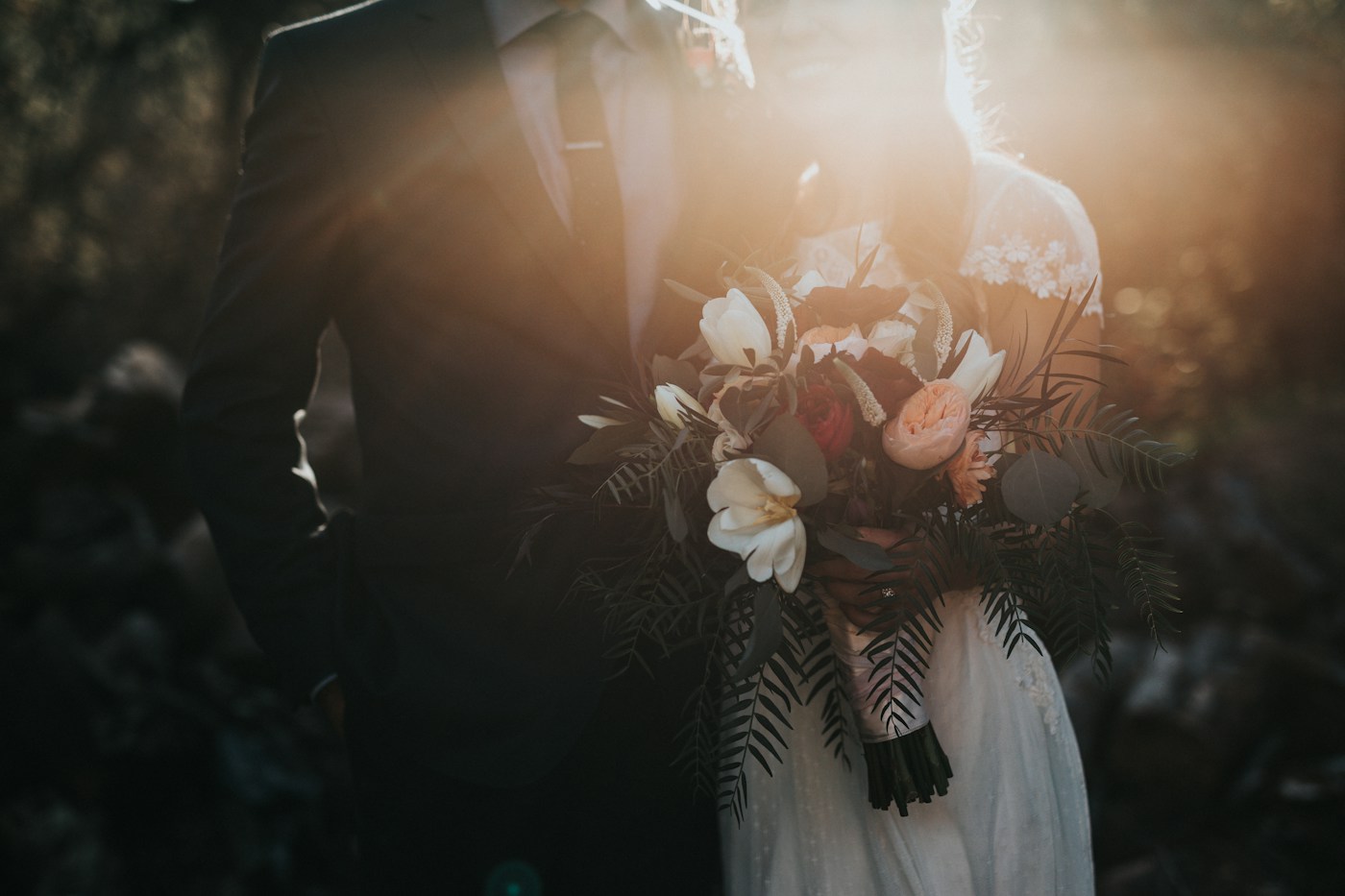 Close-up of a bridal bouquet in warm evening light